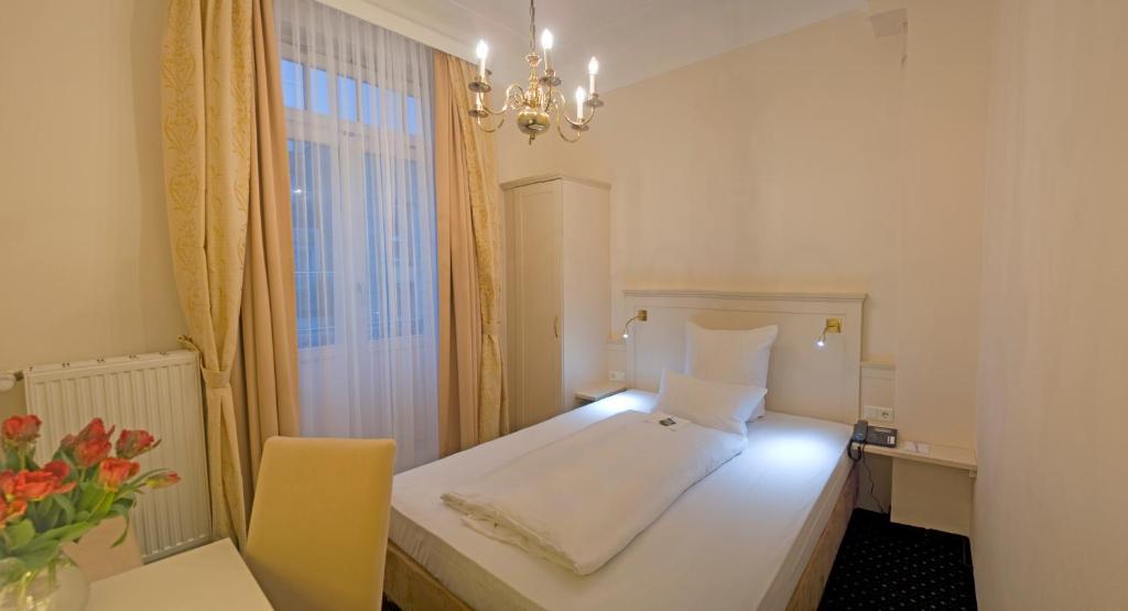 Cama o camas de una habitación en Hotel Fürst Bismarck