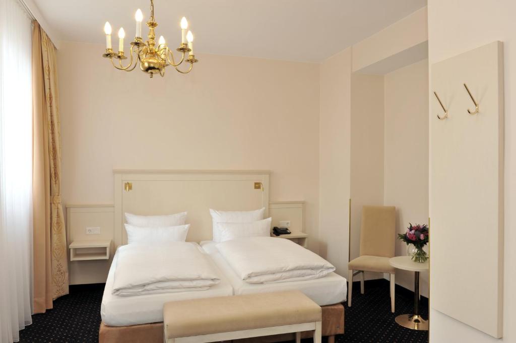 Cama o camas de una habitación en Hotel Fürst Bismarck