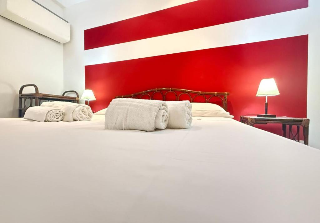 Łóżko lub łóżka w pokoju w obiekcie CasinadellePalme Appartamento in centro zona porto