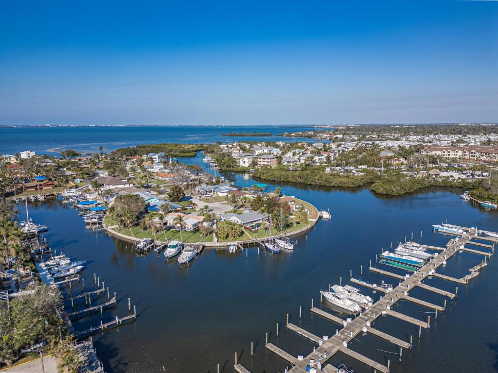 an aerial view of a marina with boats in the water at Studio, kitchenette, pool & Tiki Bar in Sarasota