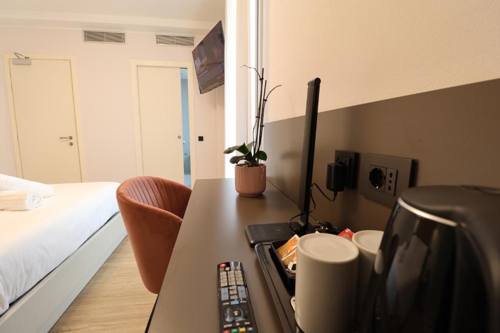 Postel nebo postele na pokoji v ubytování Hotel Miratorre superior