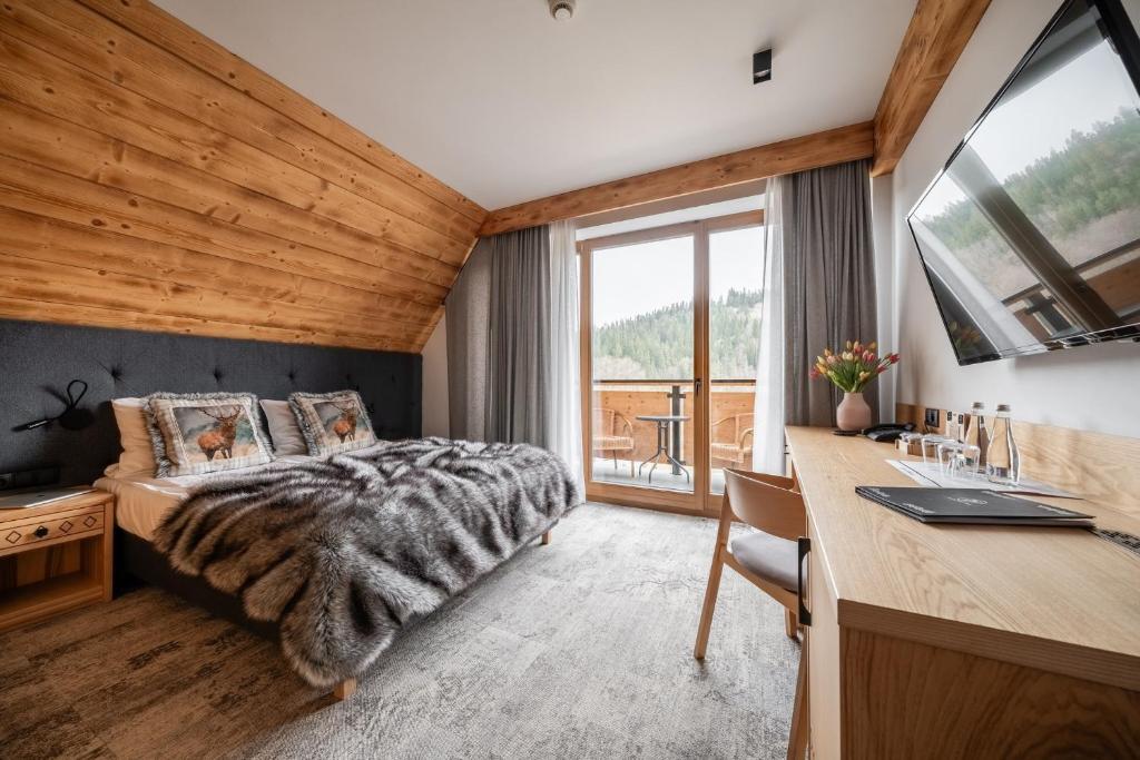 Postel nebo postele na pokoji v ubytování Hotel Litworowy Staw