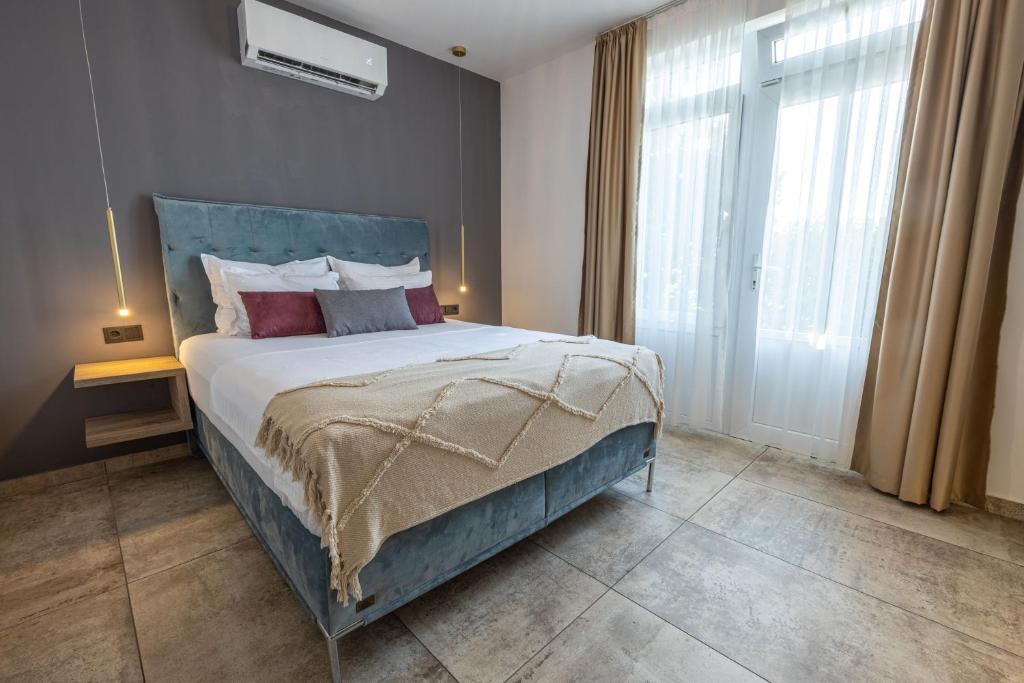 Letto o letti in una camera di Boka Bay Residences
