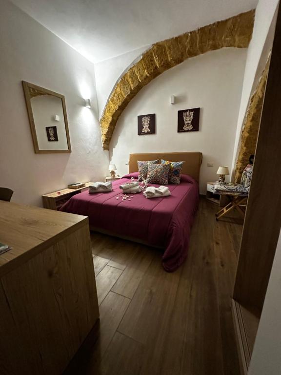 Postel nebo postele na pokoji v ubytování O munti rooms