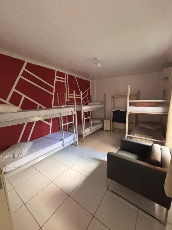 Postel nebo postele na pokoji v ubytování Hostel Pousada Curitiba Budget