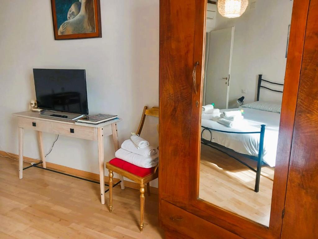 TV a/nebo společenská místnost v ubytování Appartamento Palma