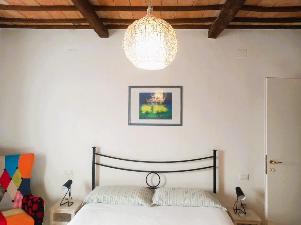 Postel nebo postele na pokoji v ubytování Appartamento Palma