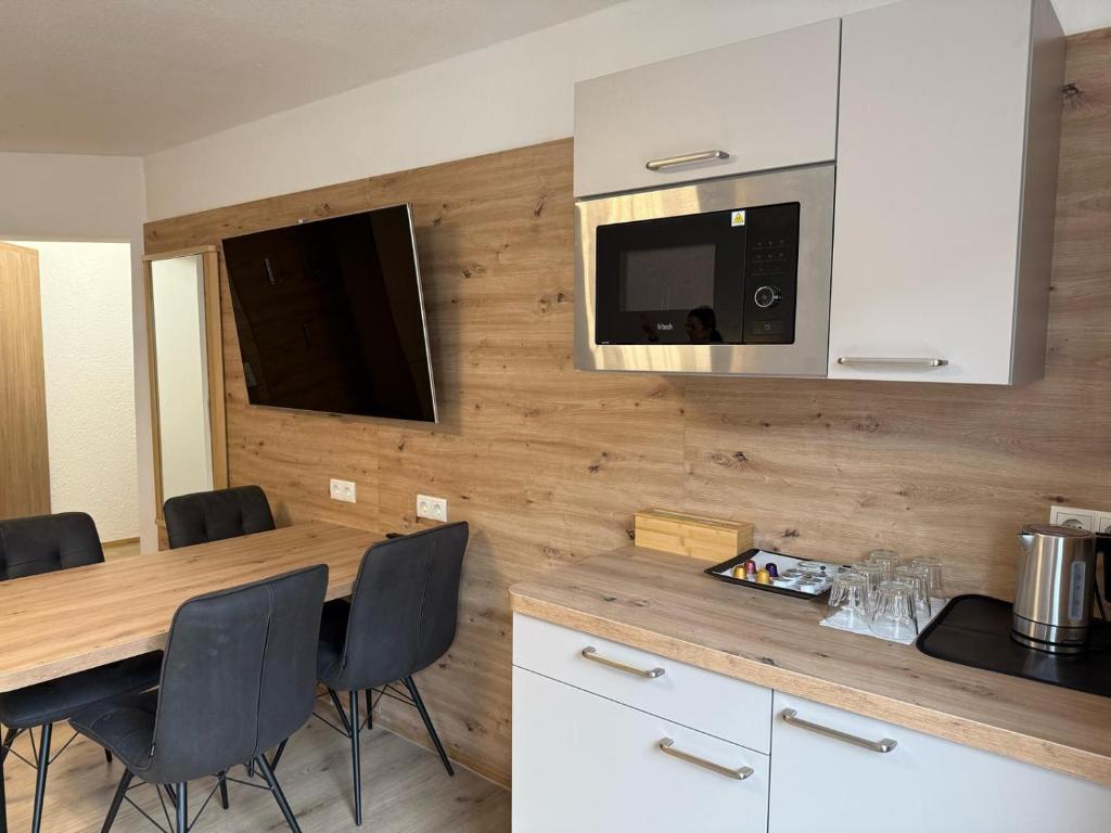 Kuchyň nebo kuchyňský kout v ubytování Gästehaus Rana