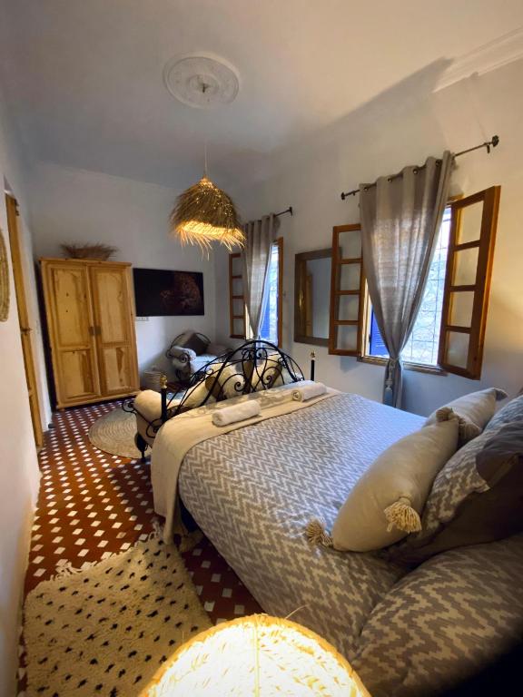 Postel nebo postele na pokoji v ubytování Dar Dada la totalité du Riad à votre disposition et de façon exclusive