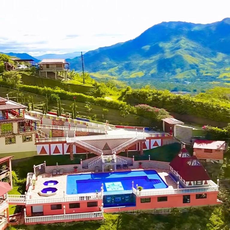 an aerial view of a resort with a swimming pool at Finca Hotel Villa Tara in Barbosa