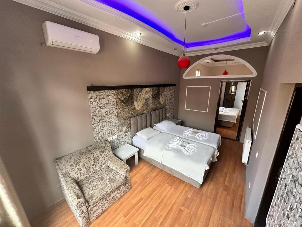 Postel nebo postele na pokoji v ubytování batummetropol hotel