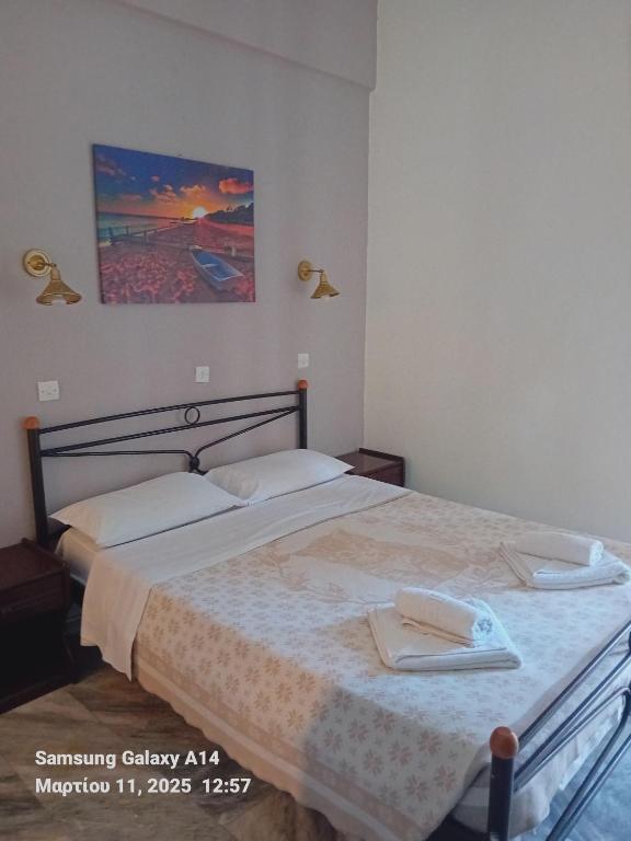 Postel nebo postele na pokoji v ubytování Giorgos House