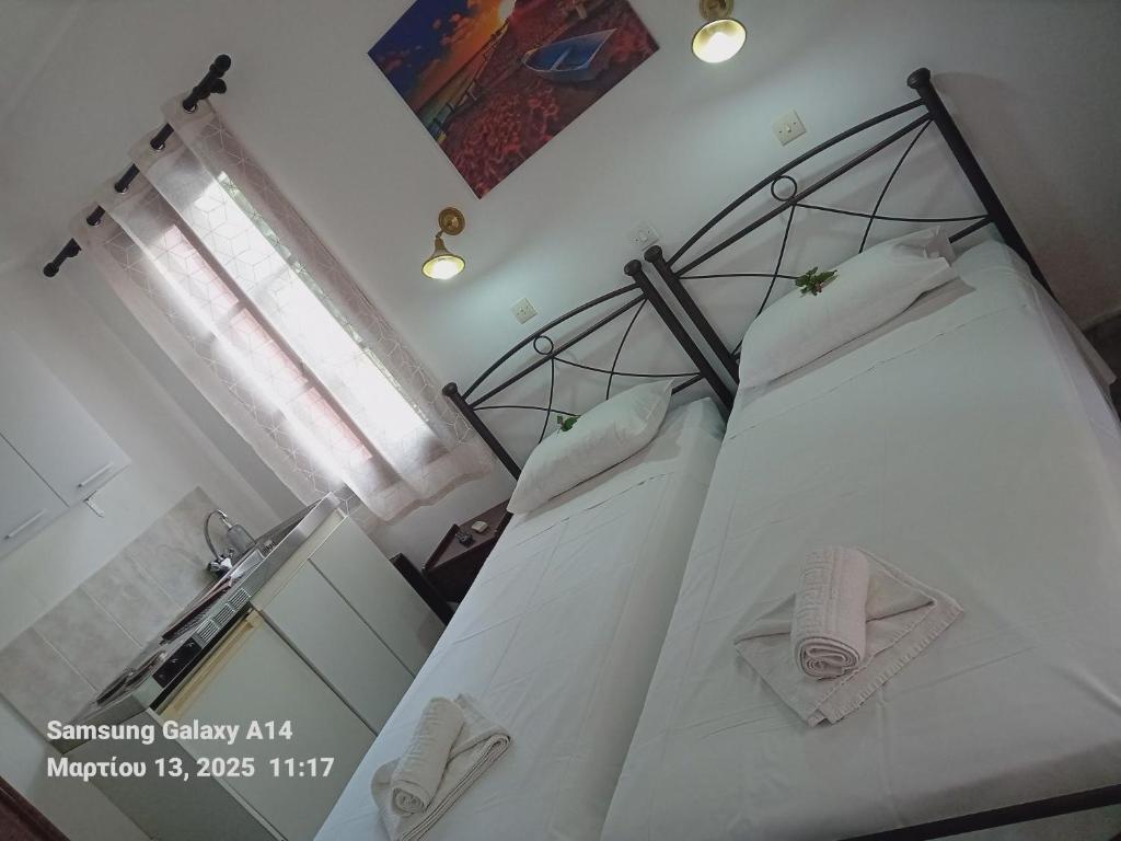 Postel nebo postele na pokoji v ubytování Giorgos House
