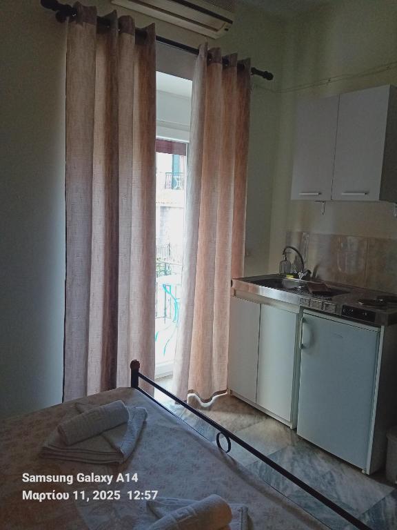 Kuchyň nebo kuchyňský kout v ubytování Giorgos House