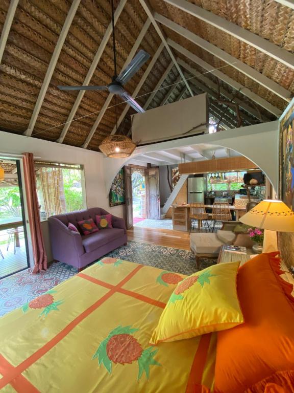 Postel nebo postele na pokoji v ubytování LOFT VANILLE avec clim et piscine partagee