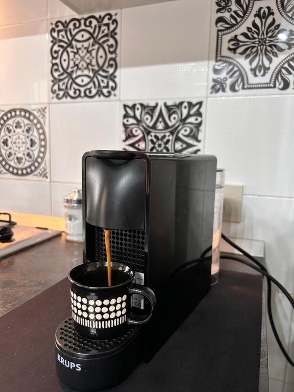 Coffee and tea making facilities at Apartment Omnia