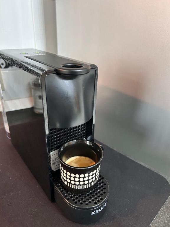 Coffee and tea making facilities at Apartment Omnia
