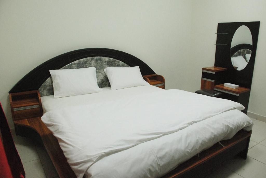 Postel nebo postele na pokoji v ubytování Paradise Inn Hotel (Tabasum Group)
