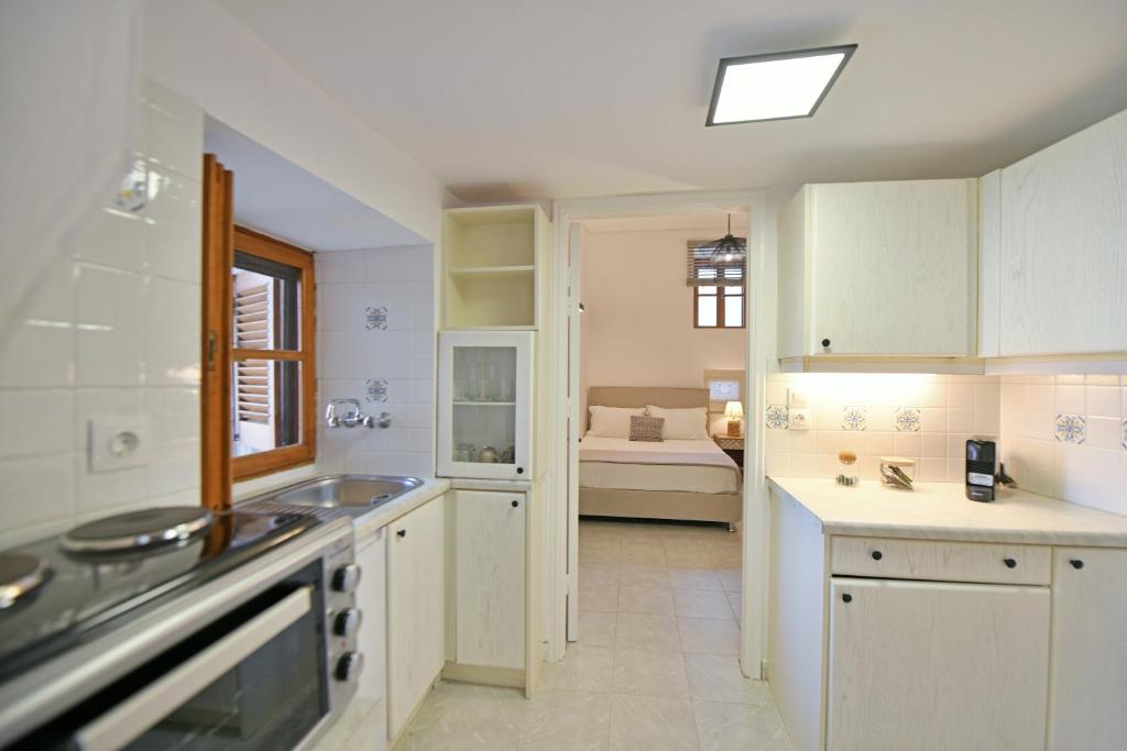 Kuchyň nebo kuchyňský kout v ubytování Psaropoula Guest House