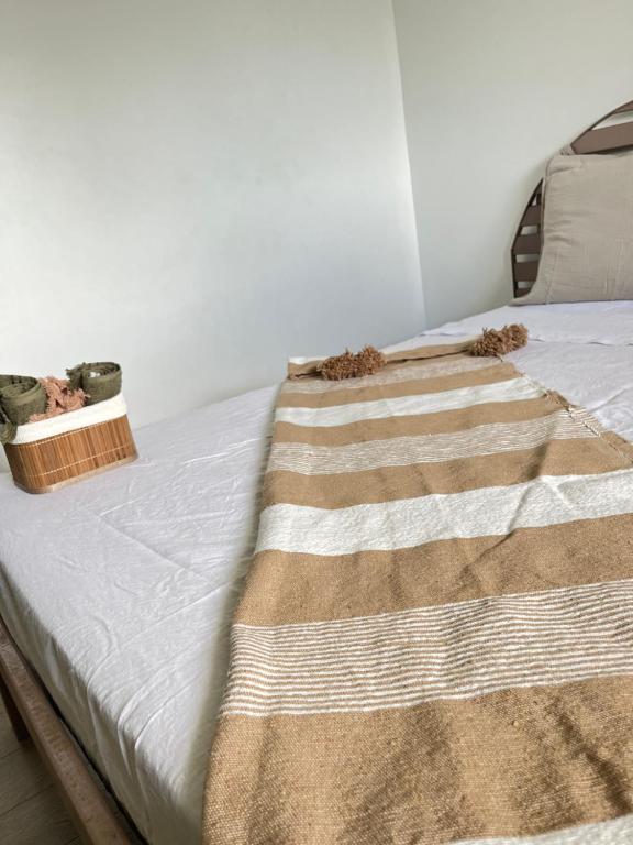 Postel nebo postele na pokoji v ubytování Villa L'Écrin du Colibri Martinique