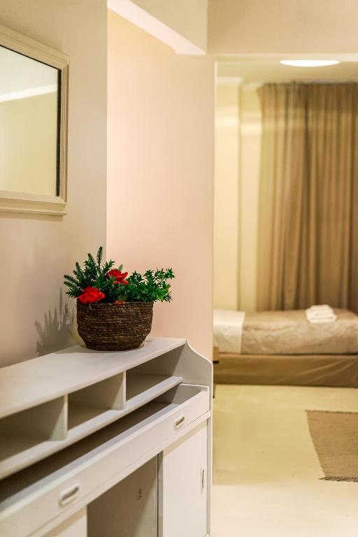 A bed or beds in a room at Zacharitsa APT at Acropolis up 4 guests by LODGESPOT