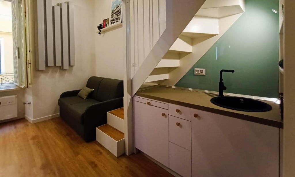 A seating area at Tolli Colosseo Apartment