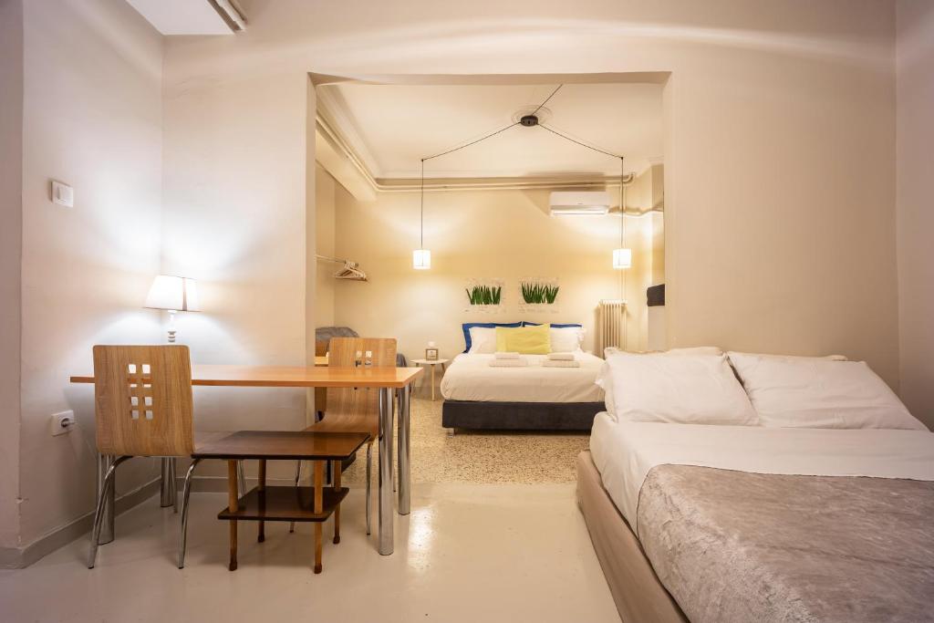 A bed or beds in a room at Zacharitsa APT at Acropolis up 4 guests by LODGESPOT