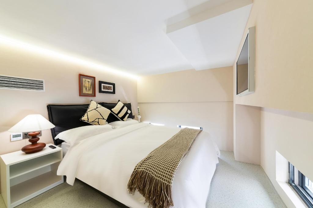 Postel nebo postele na pokoji v ubytování Vishan Keys Hotel 维尚潮宿