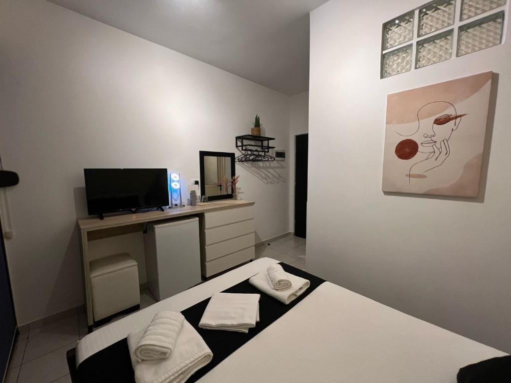 Postel nebo postele na pokoji v ubytování jericho rooms