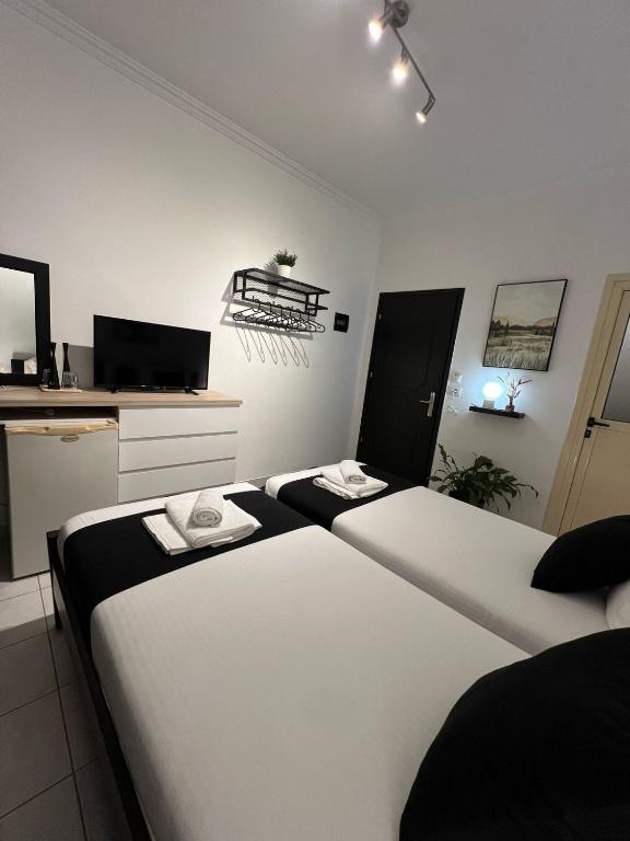 Postel nebo postele na pokoji v ubytování jericho rooms