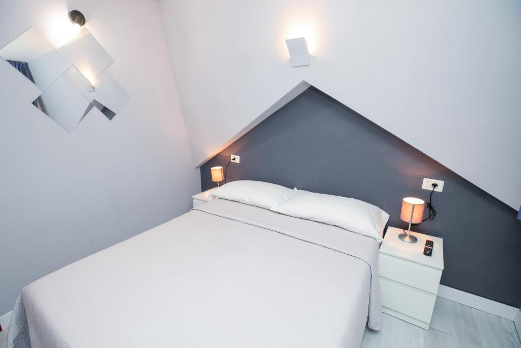 Postel nebo postele na pokoji v ubytování Hotel Brienz