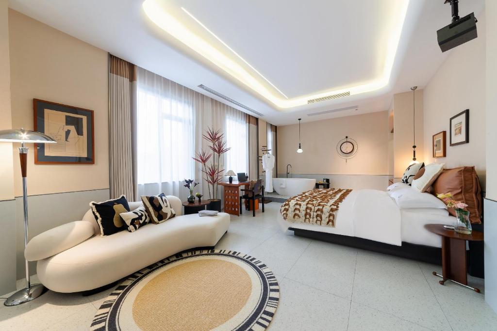 Postel nebo postele na pokoji v ubytování Vishan Keys Hotel 维尚潮宿
