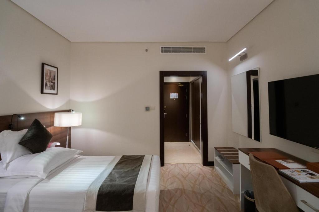 TV a/nebo společenská místnost v ubytování Landmark Darkm Hotel Makkah
