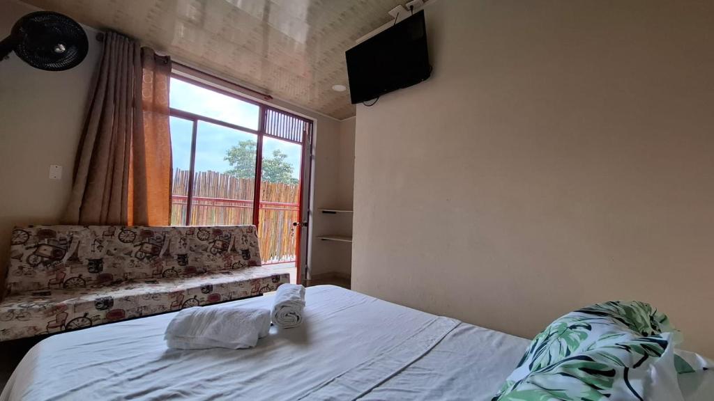 Postel nebo postele na pokoji v ubytování New Paradise Nueva Sede - La Vega Cundinamarca