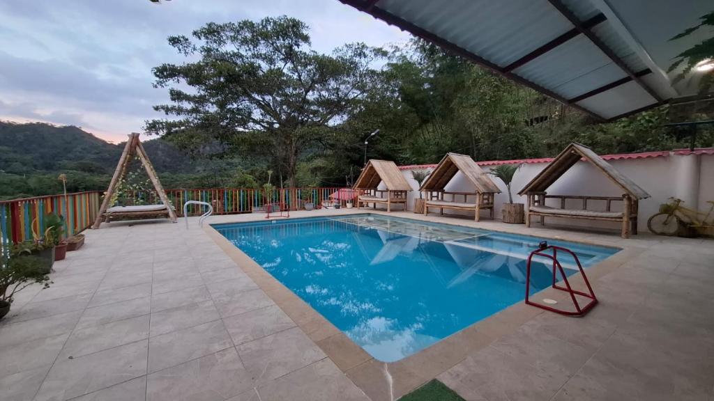 Bazén v ubytování New Paradise Nueva Sede - La Vega Cundinamarca nebo v jeho okolí