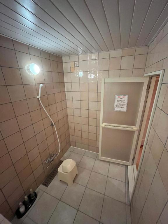Koupelna v ubytování ホテルアンの家