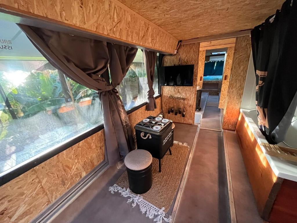 TV a/nebo společenská místnost v ubytování Palm Bus