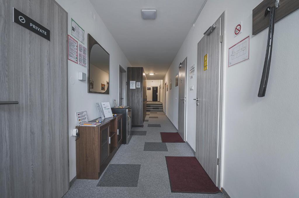 TV a/nebo společenská místnost v ubytování DO AVTA Rooms