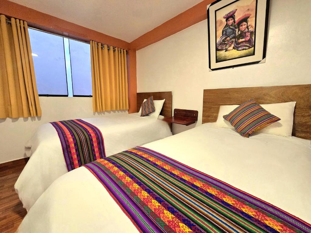 Postel nebo postele na pokoji v ubytování Amakonkay Machupicchu