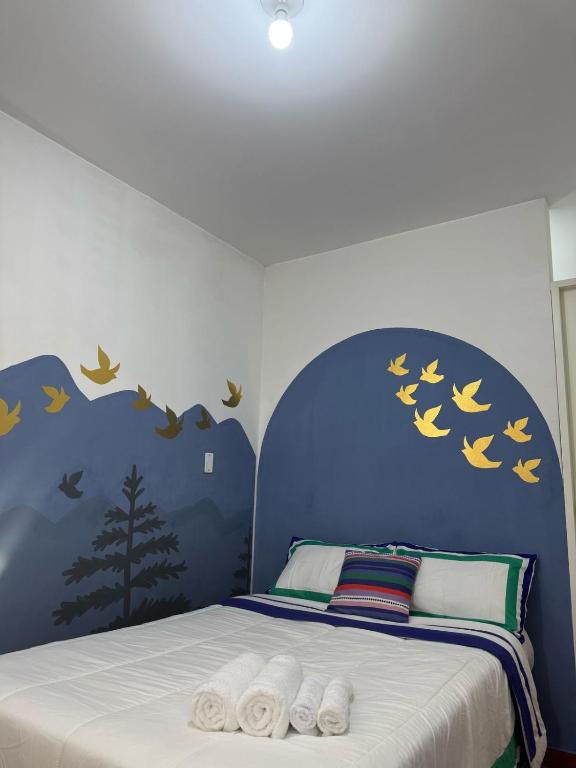 Postel nebo postele na pokoji v ubytování Puerta Azul Hospedaje