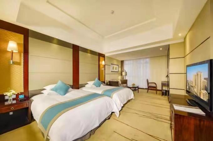 TV a/nebo společenská místnost v ubytování Gaosu New Century Hotel International Anhui