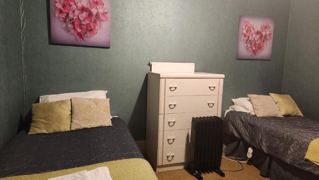Postel nebo postele na pokoji v ubytování Fairlie Hotel