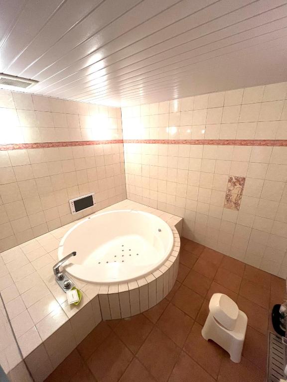 Koupelna v ubytování ホテルアンの家