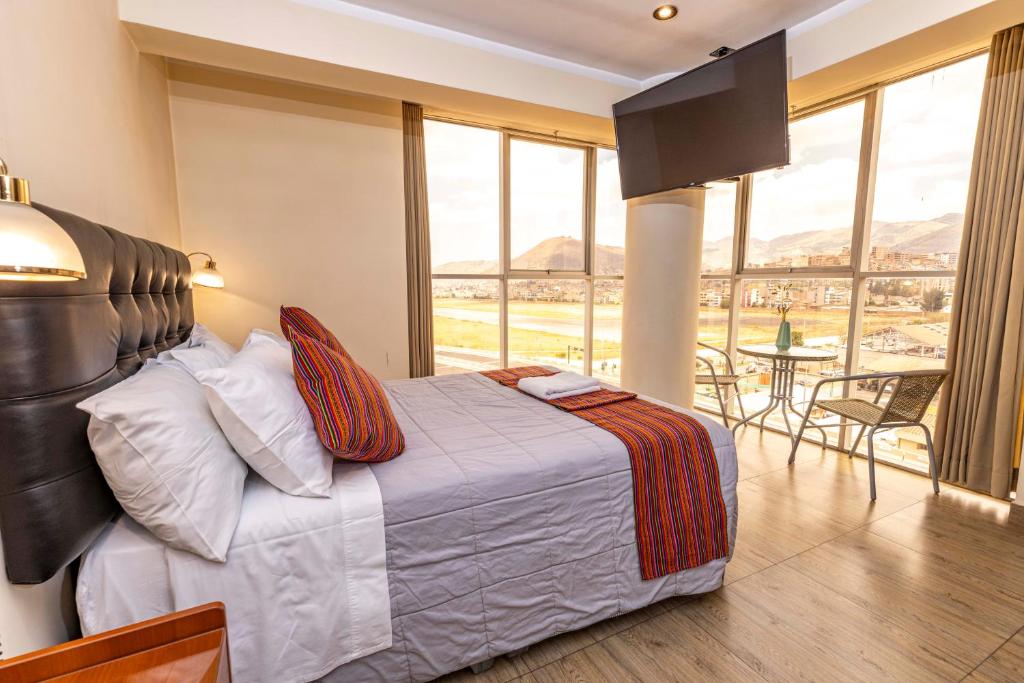 Postel nebo postele na pokoji v ubytování Hotel Sky Mirador