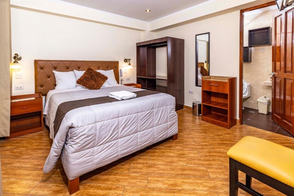Postel nebo postele na pokoji v ubytování Hotel Sky Mirador