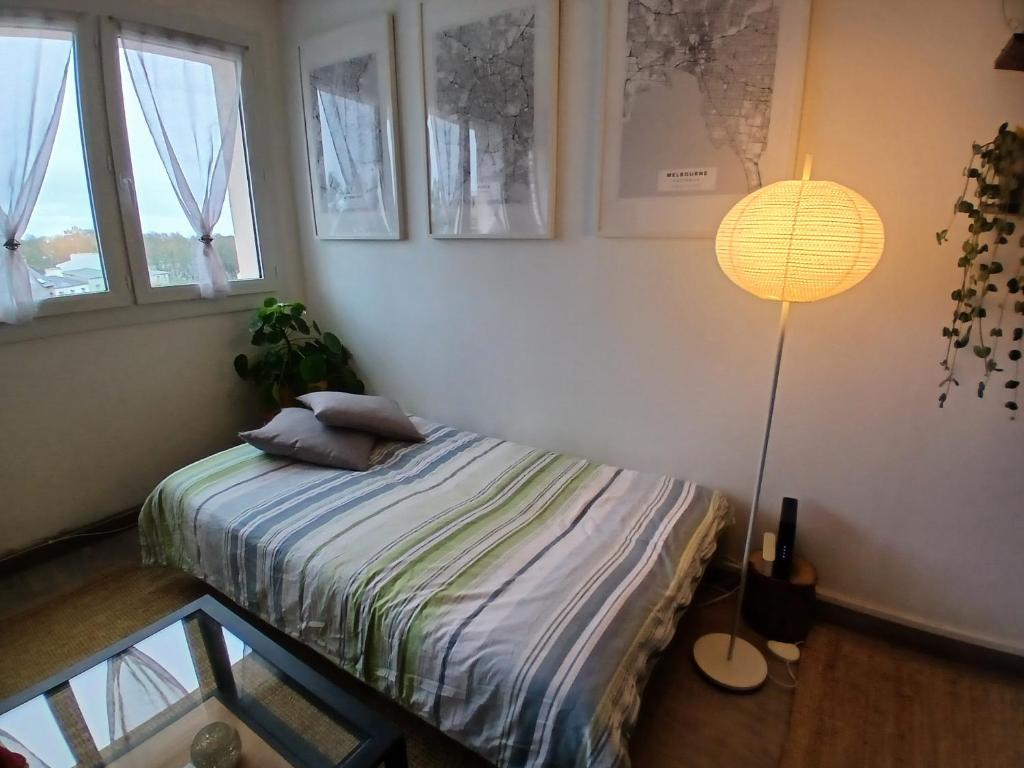 Postel nebo postele na pokoji v ubytování Appartement lumineux 70 m2 proche centre