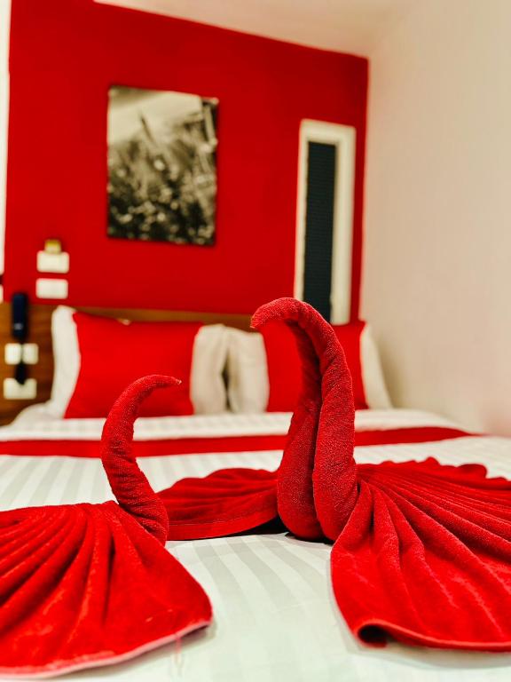 Postel nebo postele na pokoji v ubytování PJ Patong Resortel