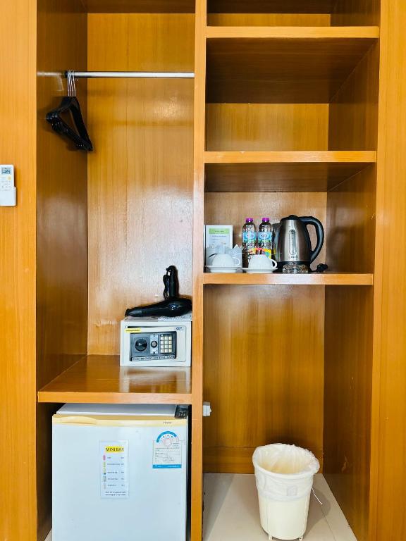 Kuchyň nebo kuchyňský kout v ubytování PJ Patong Resortel