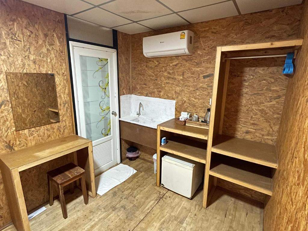 Kuchyň nebo kuchyňský kout v ubytování Koh Ngai Sea Open Resort