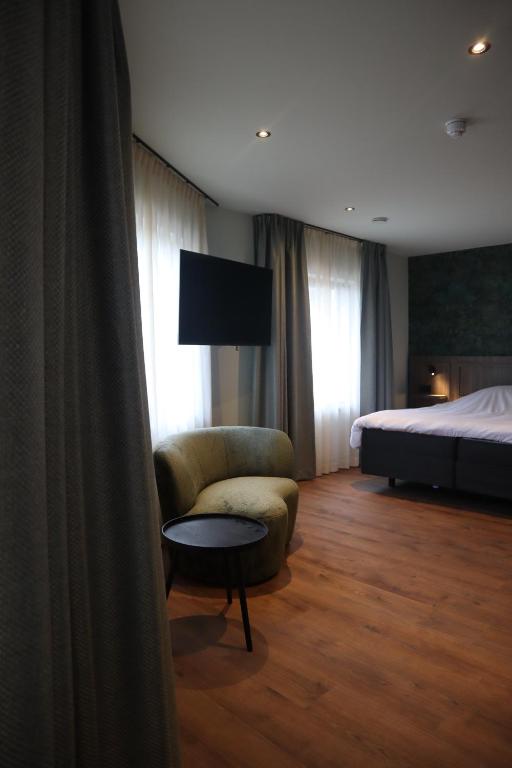 Postel nebo postele na pokoji v ubytování Hotel Central